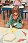 Child playing with paper