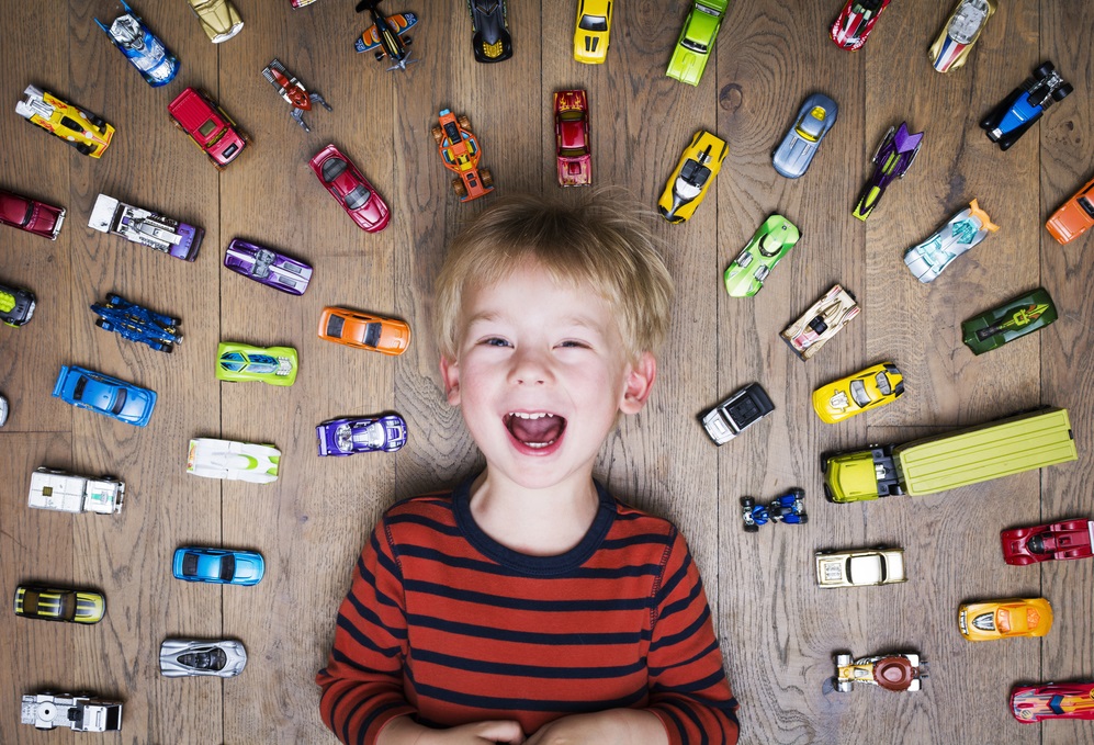 boy with toy car