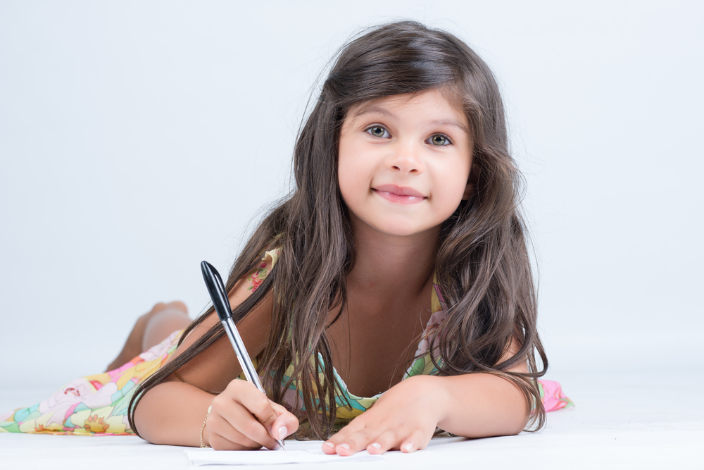 cute-girl-writing-a-letter