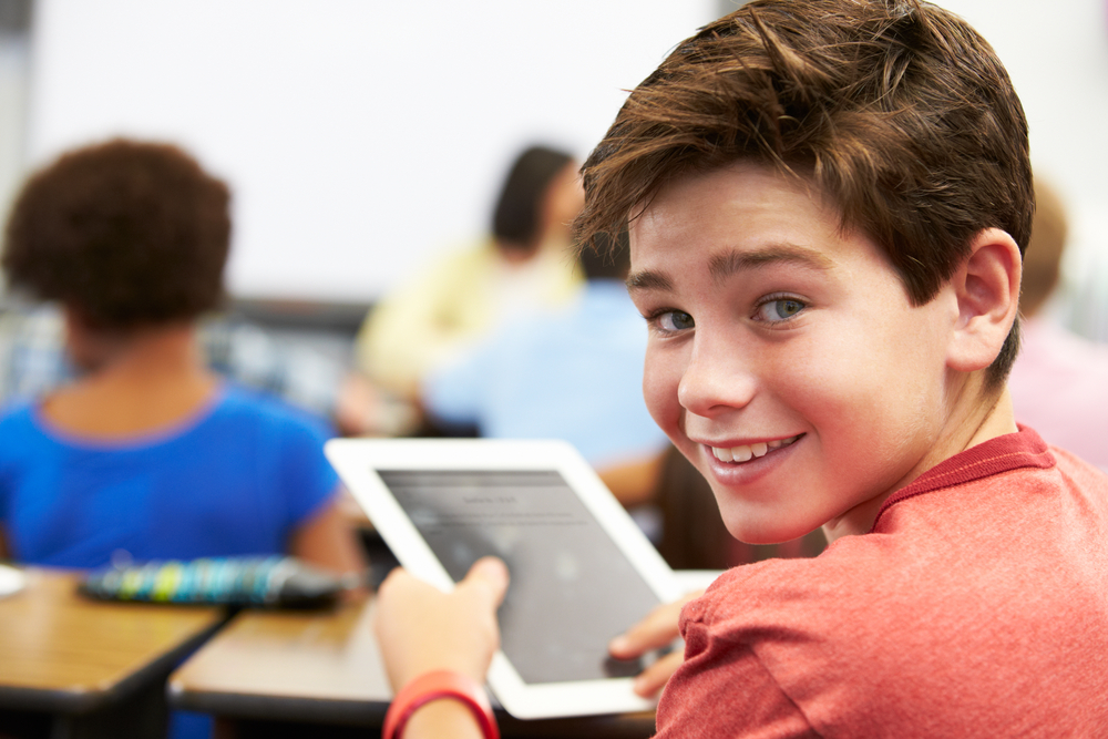 boy-in-class-with-tablet