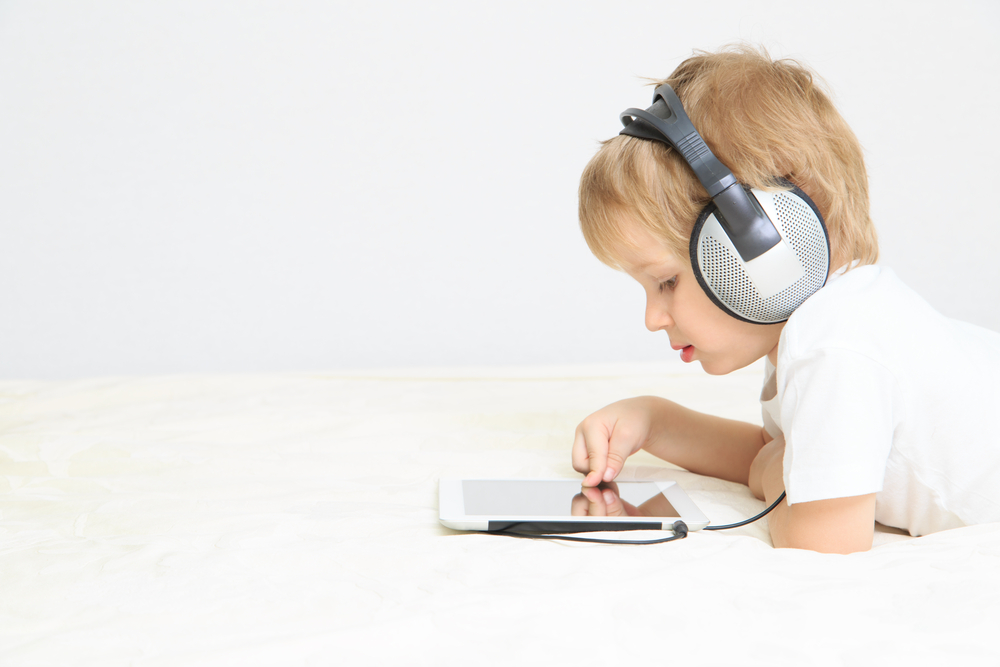boy-with-headphones-and-tablet