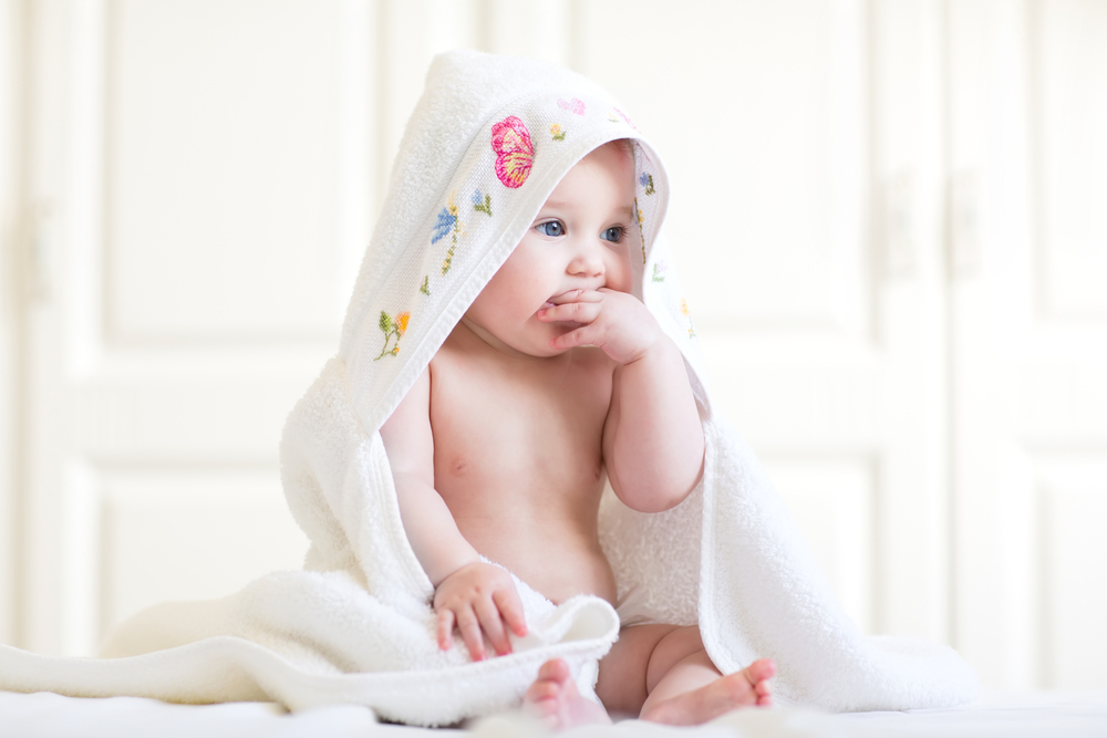 cute-baby-girl-wrapped-up-in-her-blanket