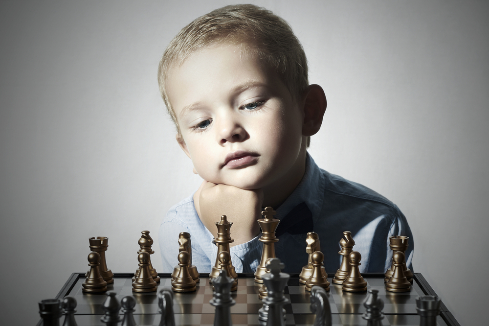 little-boy-playing-chess