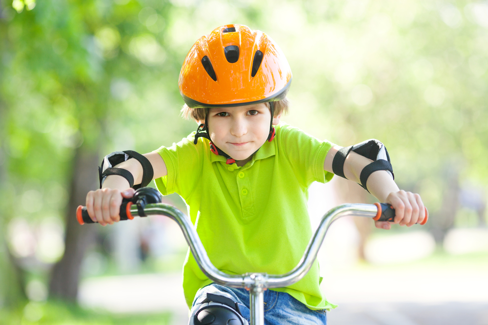 the-boy-in-the-protective-helmet-for-bike