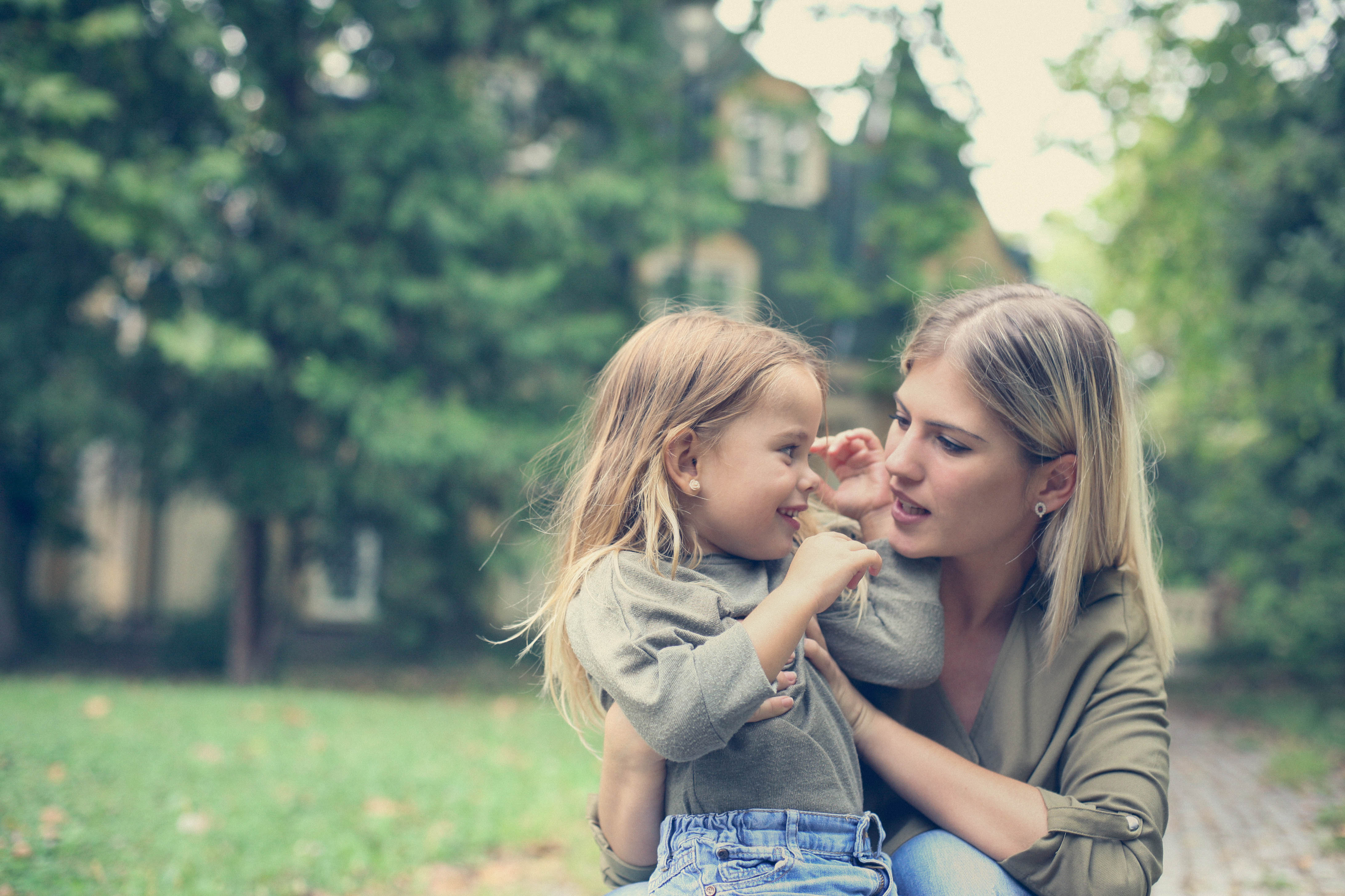 cute-little-girl-talking-her-mother