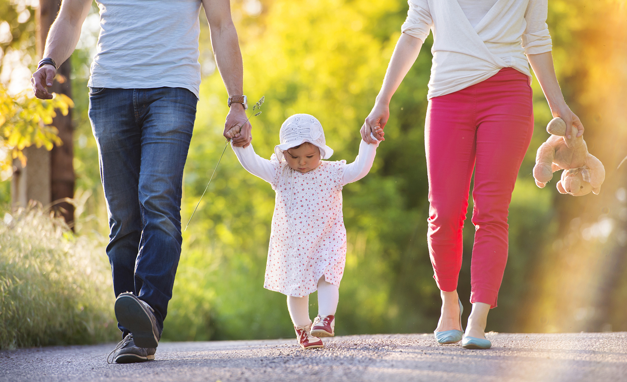 happy-young-family-having-fun-outside-in-spring-nature.