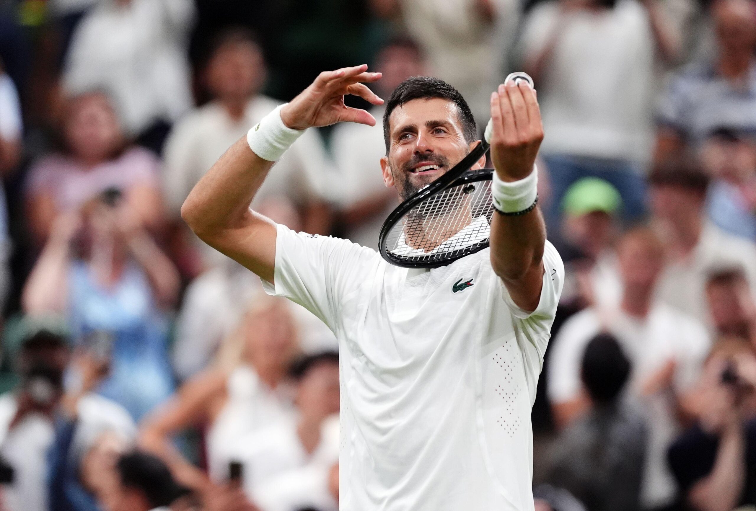 Novak Djokovic celebrating on court at Wimbledon