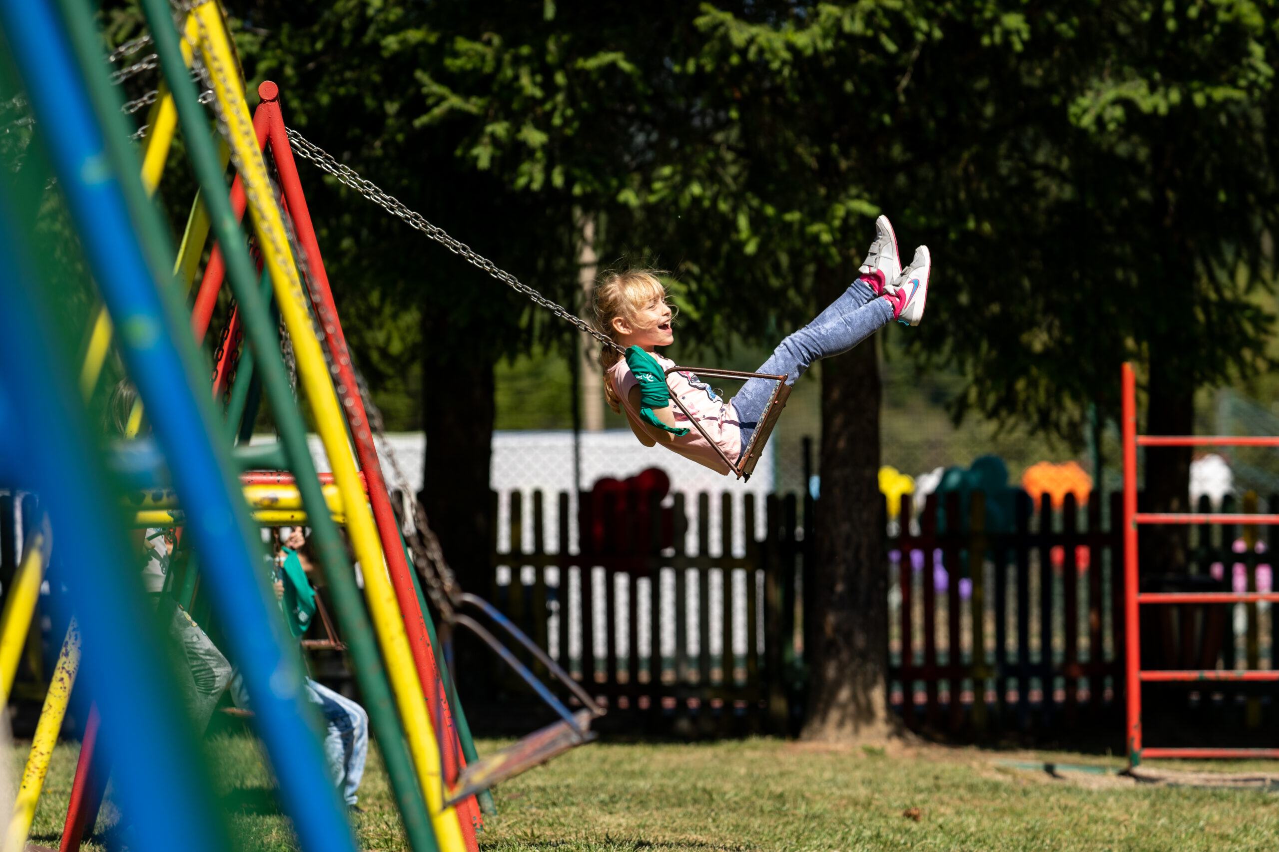 A girl on swing playing